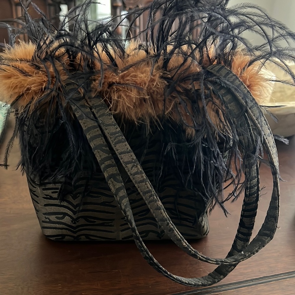 Feather trimmed purse
